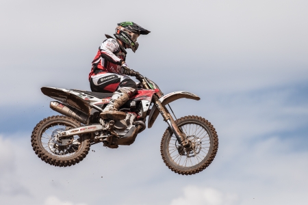 SEMIGORJE, RUSSIA - JULY 22: Grand Prix of Russia of FIM Motocross World Championship MX1 and MX2 Series on July 22, 2012 in Semigorje, Russiaのeditorial素材