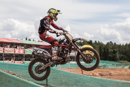 SEMIGORJE, RUSSIA - JULY 22: Grand Prix of Russia of FIM Motocross World Championship MX1 and MX2 Series on July 22, 2012 in Semigorje, Russiaのeditorial素材