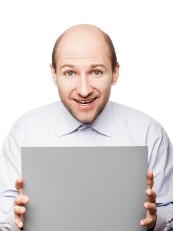 Bald smiling man hand holding grey empty blank cardの写真素材