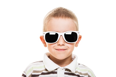 Beauty smiling child boy in sunglasses white isolatedの写真素材