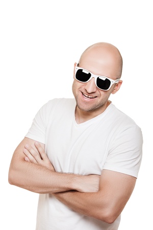Cool smiling bald or shaved head man in sunglasses white isolatedの写真素材