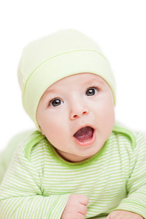 Little cute newborn baby child smiling white isolatedの写真素材