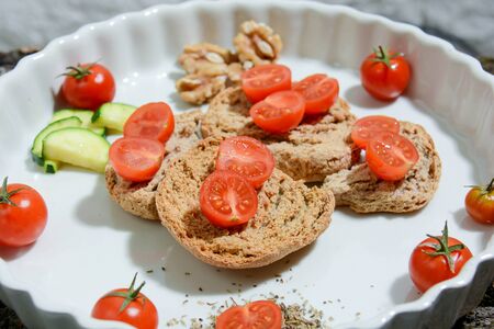 homemade Italian food: friselle with cherry tomatoes, extra virgin olive oil, salt and love