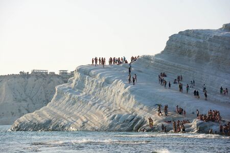 view of the Scala dei Turchi in Sicily at sunset when erosion is most visibleの写真素材