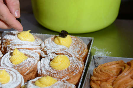 typical Italian dessert for Father's Day and St. Joseph's Day: zeppola in preparationの写真素材