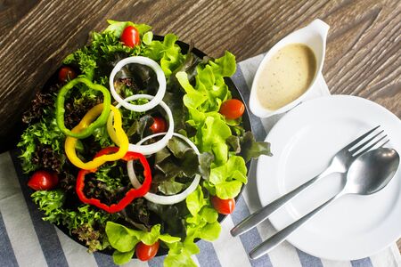 Mixed Salad on wooden tableの写真素材