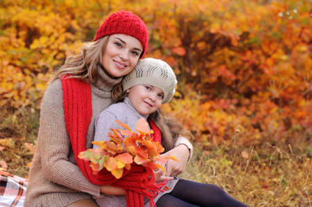 Mother and daughter wearing knitted hatsの写真素材