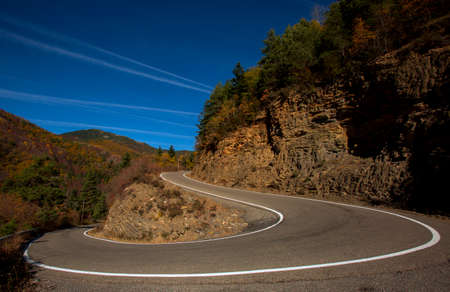 curvy road in the mountainsの写真素材