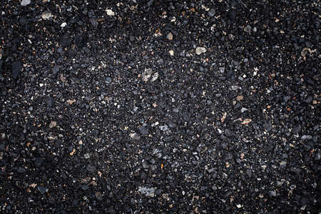 abstract black background. Pebble texture