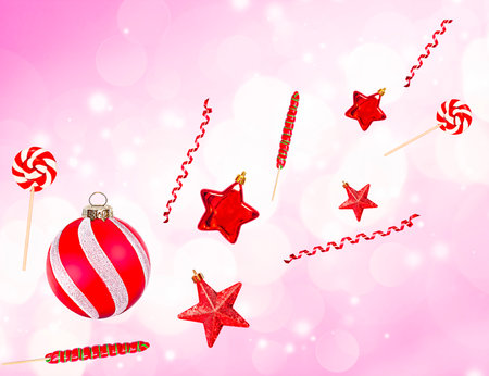 Christmas decorations on a pink background with bokeh. Levitationの写真素材
