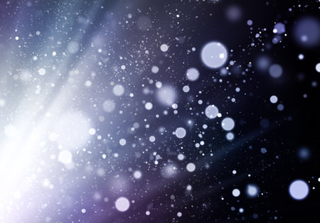 abstract christmas background with defocused lights, bokeh stars and raysの写真素材