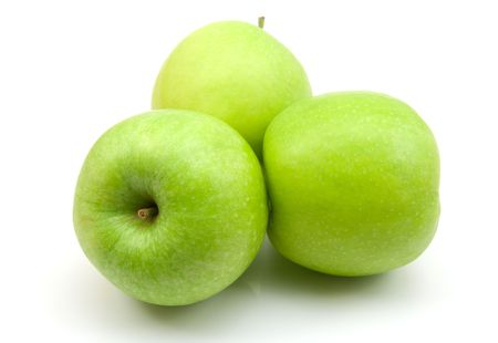 green apples isolated on the white backgroundの写真素材
