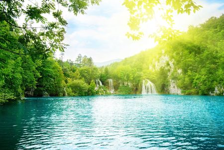 lake in deep mountain forestの写真素材