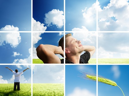 happy young man rest on wheat fieldの写真素材