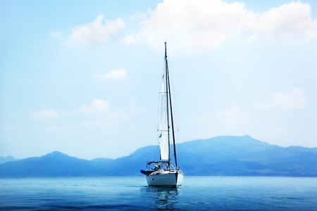 yacht and blue water oceanの写真素材