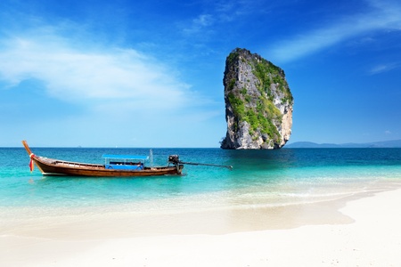 long boat and poda island in Thailandの写真素材