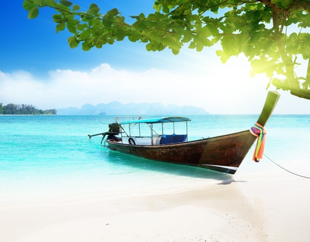 long boat and poda island in Thailandの写真素材