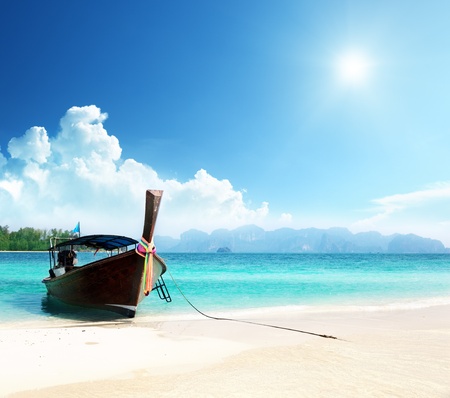 long boat and poda island in Thailandの写真素材