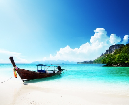 long boat and poda island in Thailandの写真素材