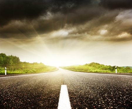 road and cloudy skyの写真素材