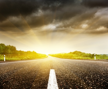 road and cloudy skyの写真素材