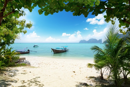 long boat on Phi Phi island in Thailandの写真素材