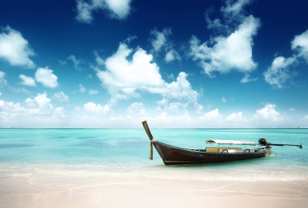 wood boat on the beachの写真素材