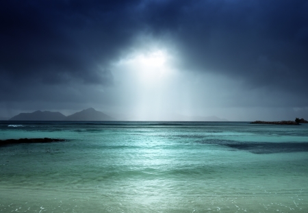 dark sky on the beach of la Digue island, Seychellesの写真素材