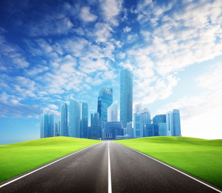 Asphalt road and modern cityの写真素材