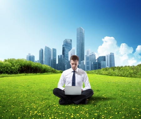 business man working in parkの写真素材