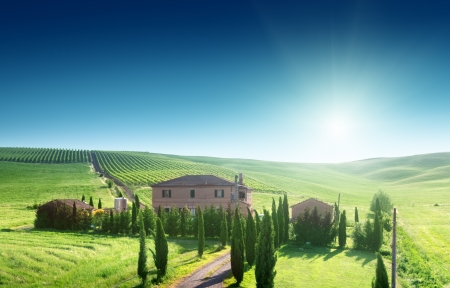 Tuscany landscape with typical farm house, Italty の写真素材