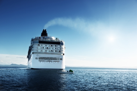 Caribbean sea and cruise ship in sunset timeの写真素材