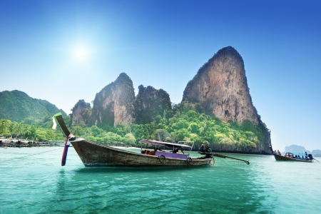 boats on Railay beach in Krabi Thailand の写真素材