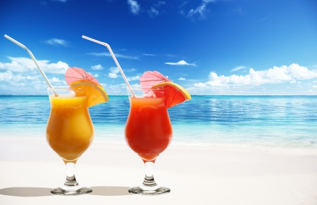 Two fresh juices on beach の写真素材