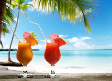 Two fresh juices on beachの写真素材