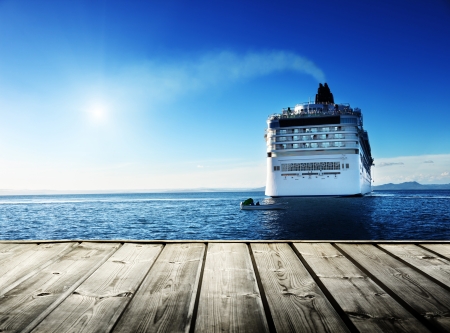 Caribbean sea and cruise ship and wood pierの写真素材