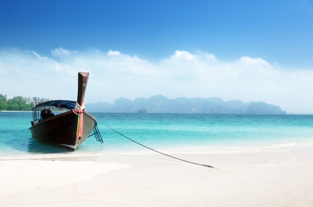 long boat on island, Thailand の写真素材