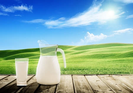 milk and sunny spring fieldの写真素材