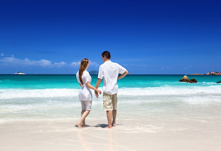 man and woman romantic couple on tropical beachの写真素材