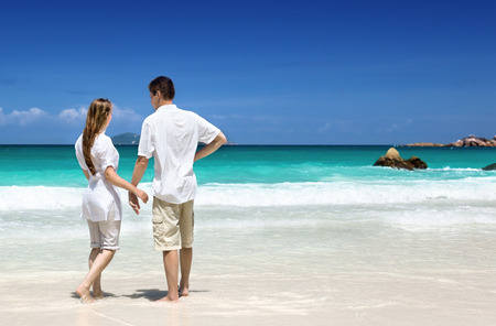 man and woman romantic couple on tropical beachの写真素材