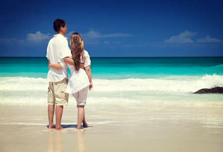 man and woman romantic couple on tropical beachの写真素材