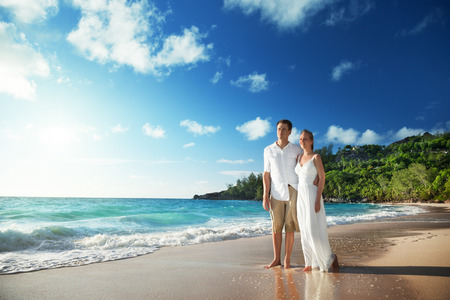 man and woman romantic couple on tropical beach の写真素材