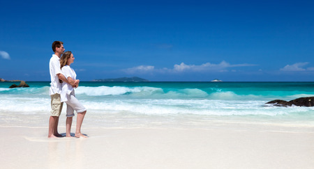 man and woman romantic couple on tropical beachの写真素材