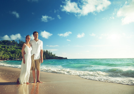 man and woman romantic couple on tropical beach の写真素材