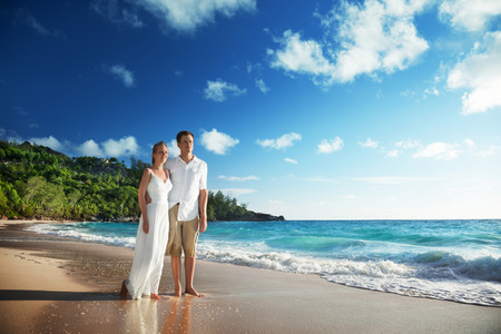 man and woman romantic couple on tropical beach の写真素材