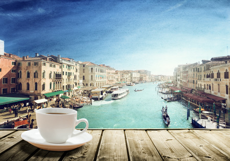 coffee on table and Venice in sunset time, Italyの写真素材