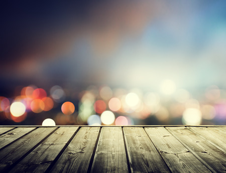 wooden platform and lights of night Hong Kongの写真素材