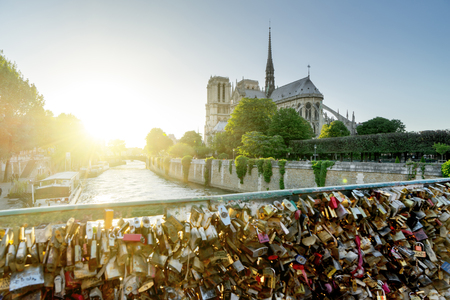 View of Notre Dame cathedral in Paris with famous locks of loveの写真素材
