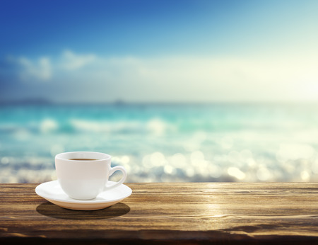 sea and cup of coffeeの写真素材