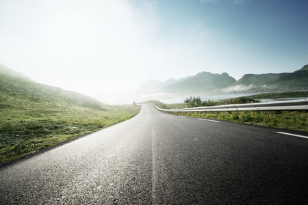 road and fog, Lofoten island, Norwayの写真素材
